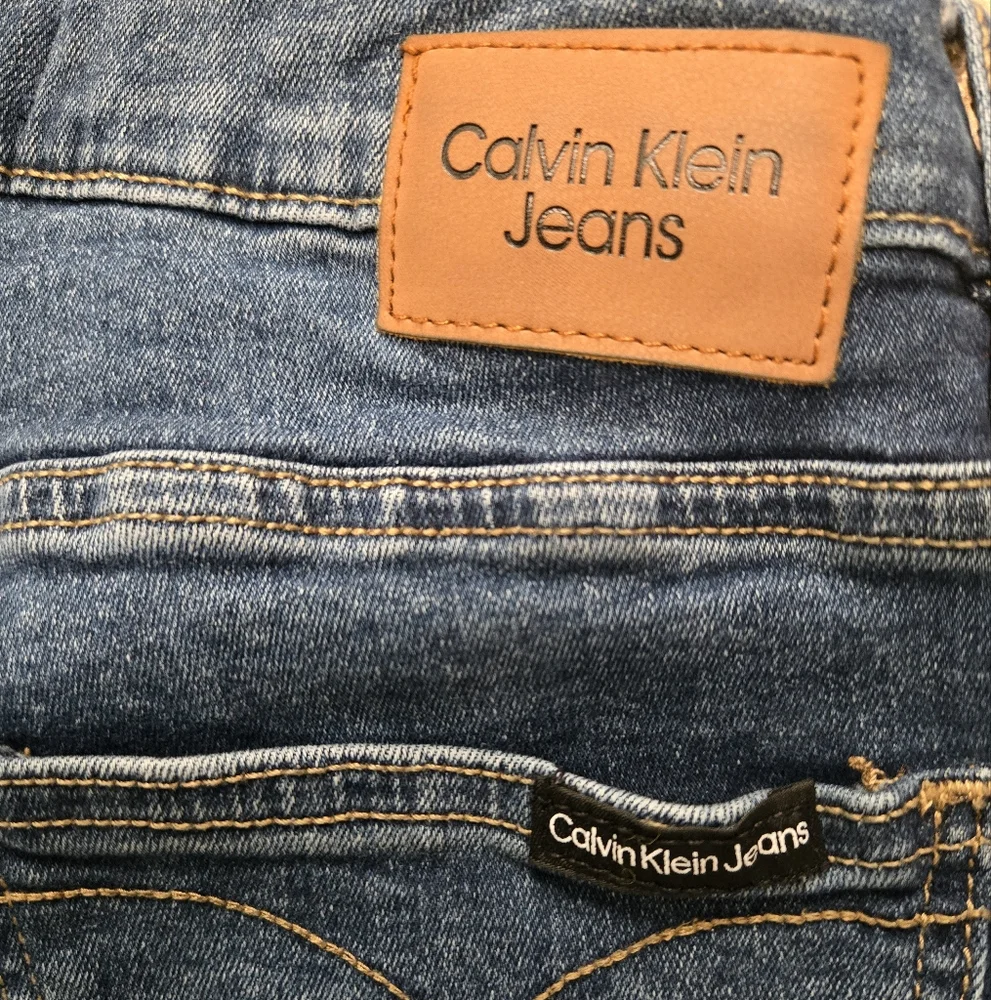 Calvin Klein Blue Mid Rise Skinny Jeans with Subtle Fading - Picture 6 of 7